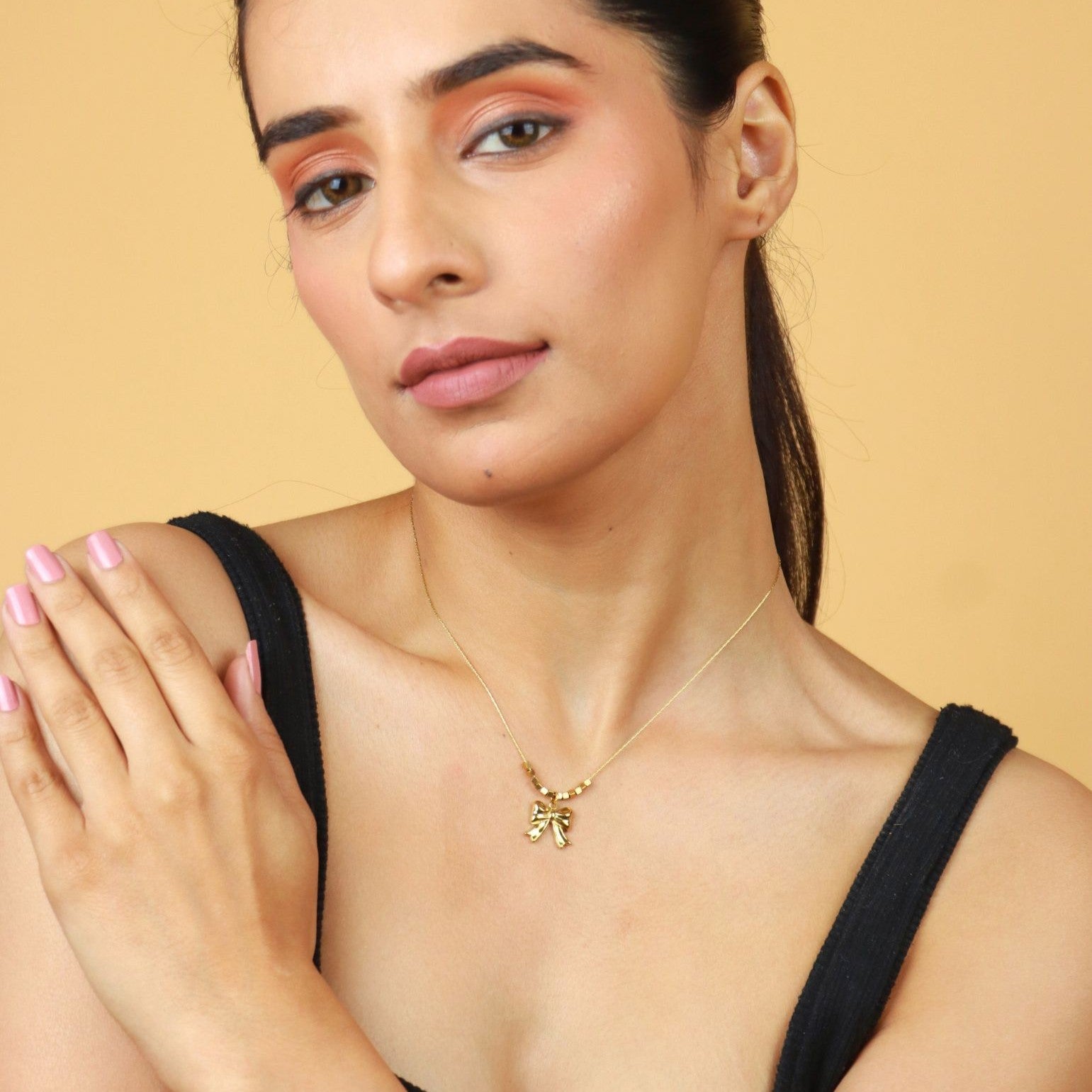 Golden Bow Charm Necklace
