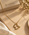 CARAV gold butterfly pendant necklace