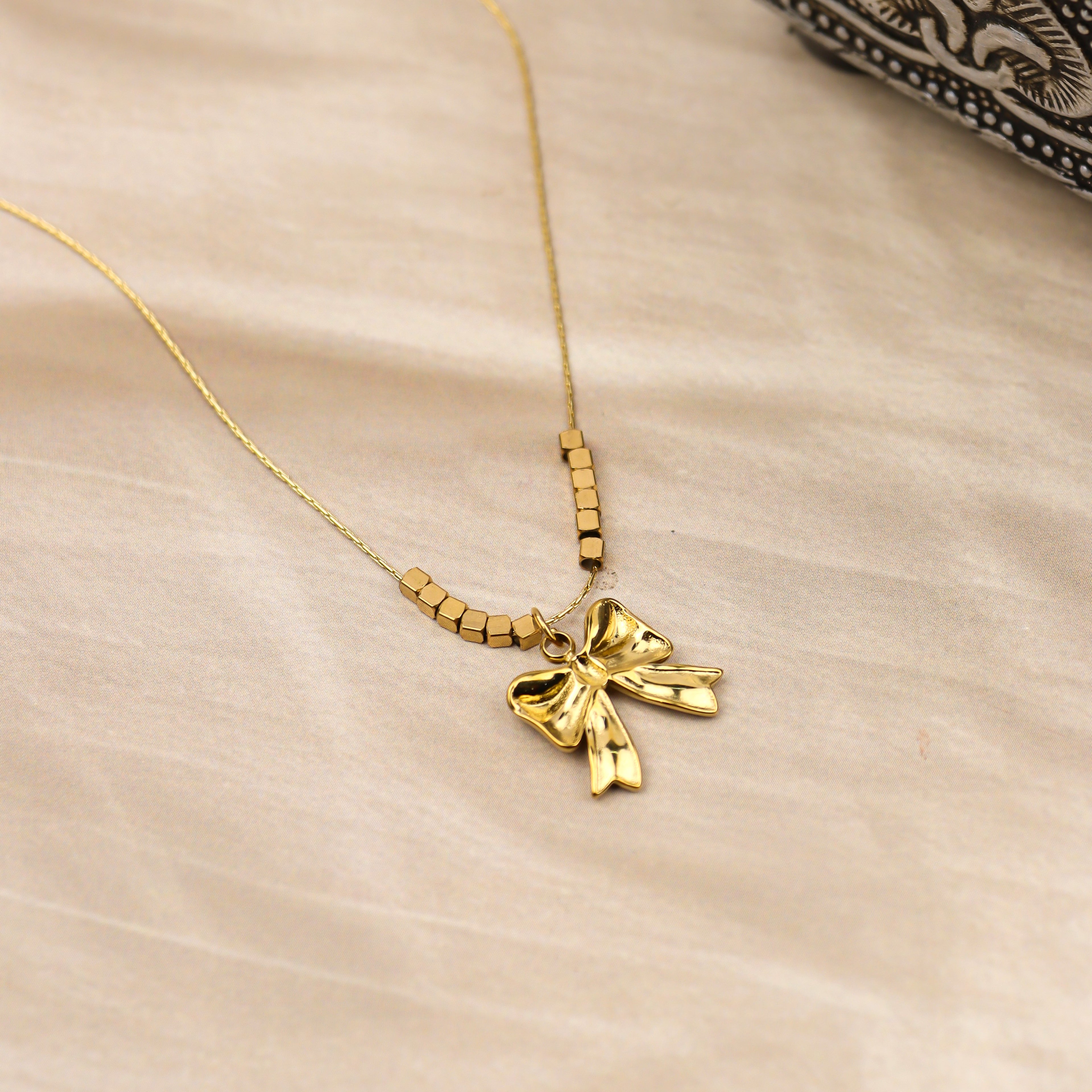 Golden Bow Charm Necklace