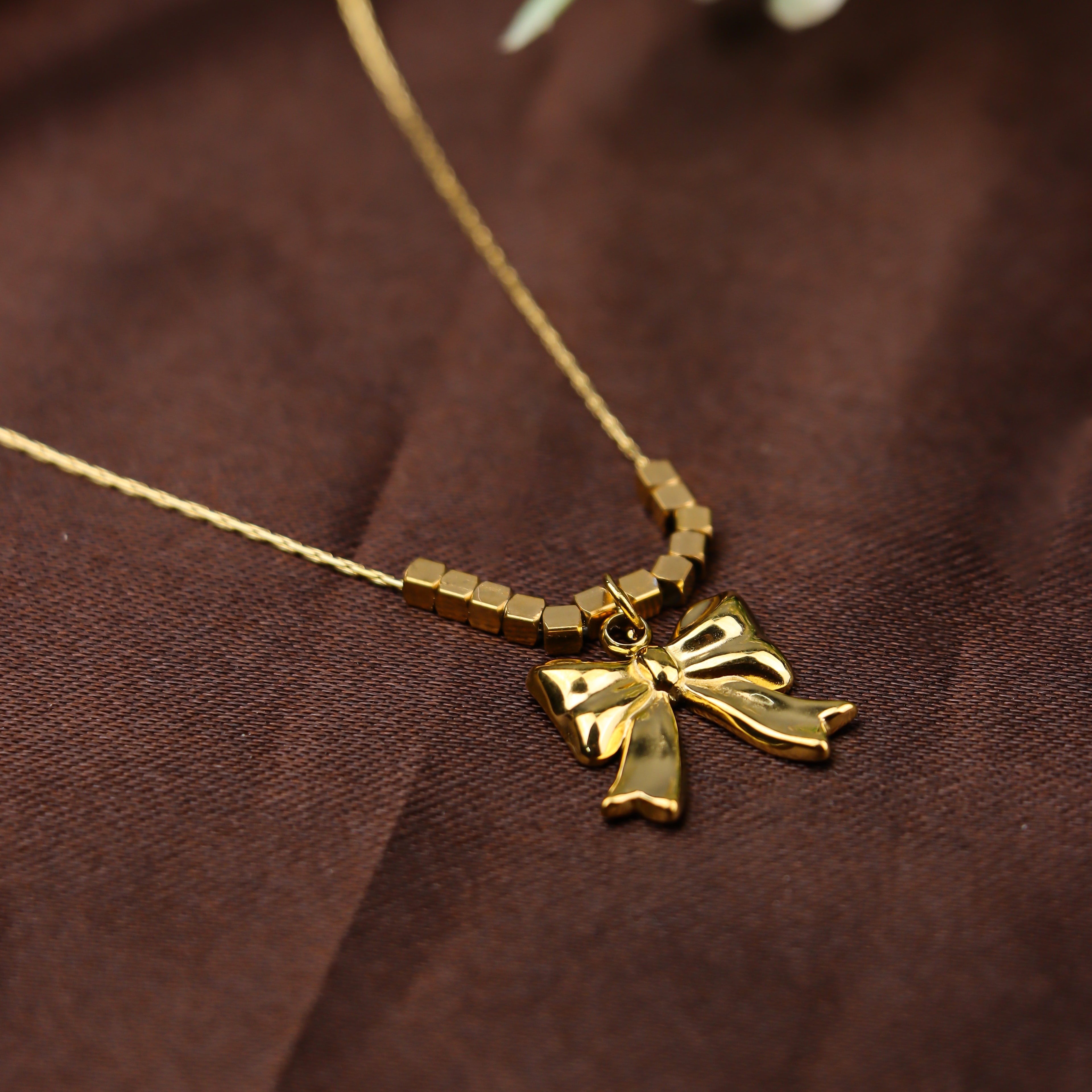 Golden Bow Charm Necklace
